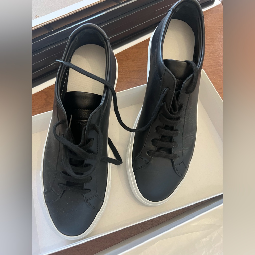 Common Projects black leather low achilles. Box, dust bag, & extra shoe laces.